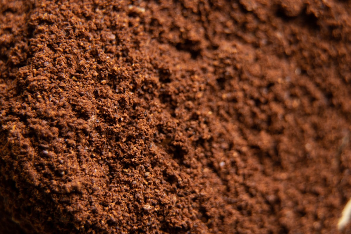 ground roasted coffee as background, coffee