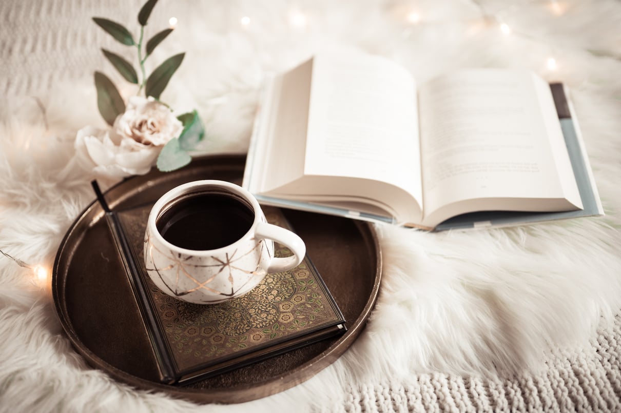 Coffee Cup and an Open Book 